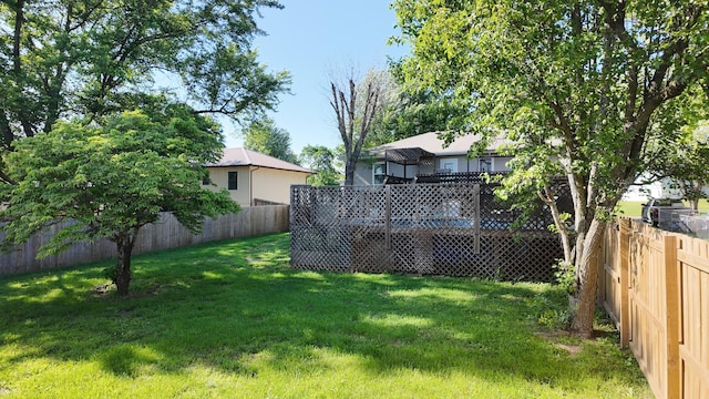 606 W Clover Dr, Clinton, MO 64735 - view of yard featuring a wooden deck