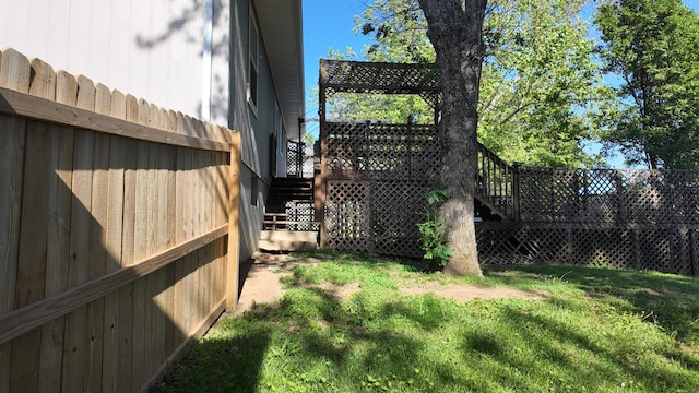 606 W Clover Dr, Clinton, MO 64735 - view of yard featuring stairs and a deck