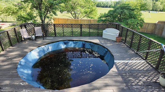 606 W Clover Dr, Clinton, MO 64735 - view of swimming pool with a deck
