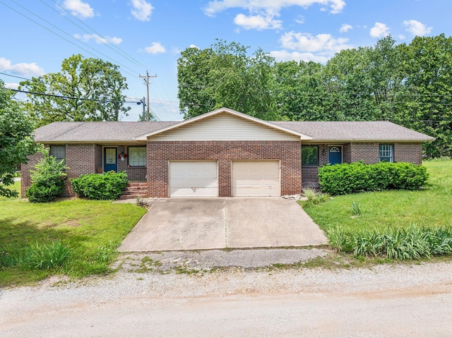 111-141 Gooseberry Ct, Branson, MO 65616 - ranch-style home featuring an attached garage, brick siding, driveway, and a front yard