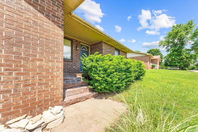 111-141 Gooseberry Ct, Branson, MO 65616 - property entrance with brick siding and a lawn
