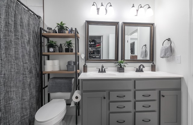205 Seigenbein Rd, Saint Robert, MO 65584 - bathroom with double vanity and toilet
