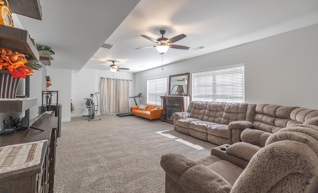 205 Seigenbein Rd, Saint Robert, MO 65584 - living room featuring a fireplace, light colored carpet, ceiling fan, and baseboards