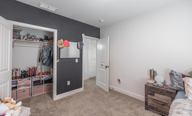 205 Seigenbein Rd, Saint Robert, MO 65584 - bedroom with carpet flooring, a closet, and baseboards