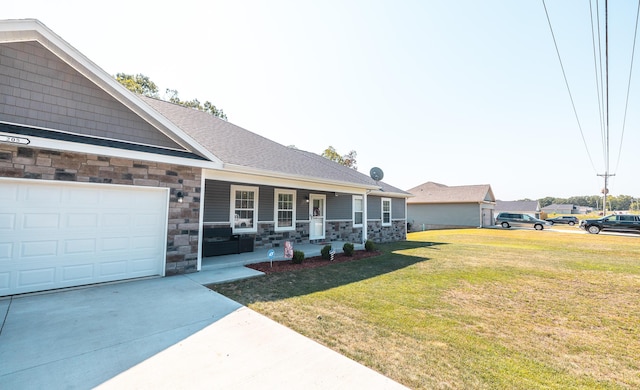 205 Seigenbein Rd, Saint Robert, MO 65584 - view of front of house featuring a porch, stone siding, an attached garage, a front lawn, and concrete driveway
