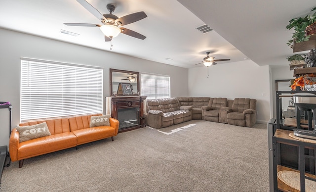205 Seigenbein Rd, Saint Robert, MO 65584 - living room featuring ceiling fan, a glass covered fireplace, and carpet