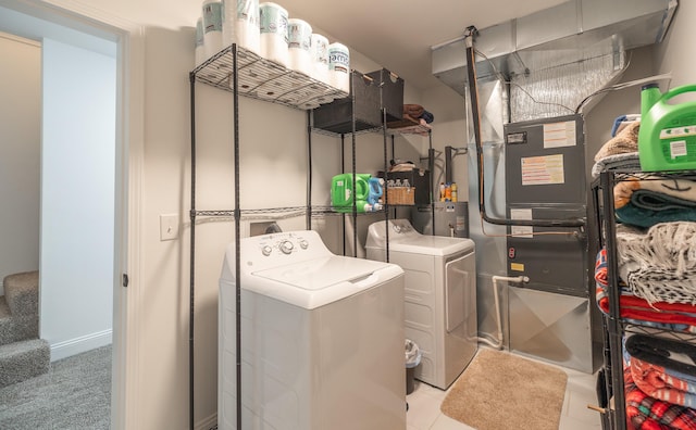 205 Seigenbein Rd, Saint Robert, MO 65584 - washroom with separate washer and dryer and tile patterned floors