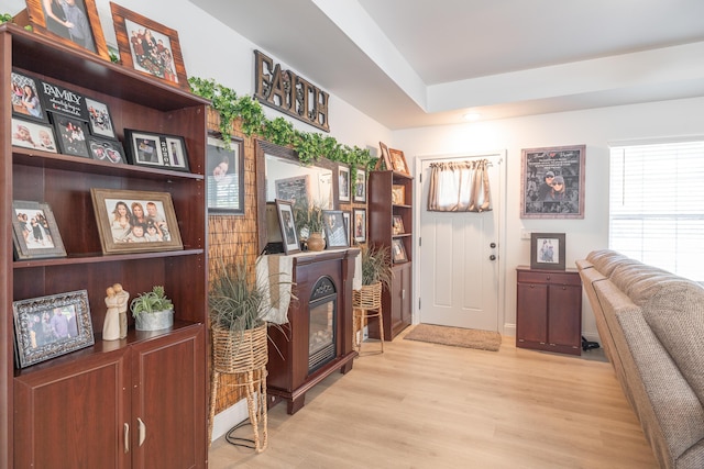 205 Seigenbein Rd, Saint Robert, MO 65584 - interior space with light wood-style flooring, a glass covered fireplace, and recessed lighting