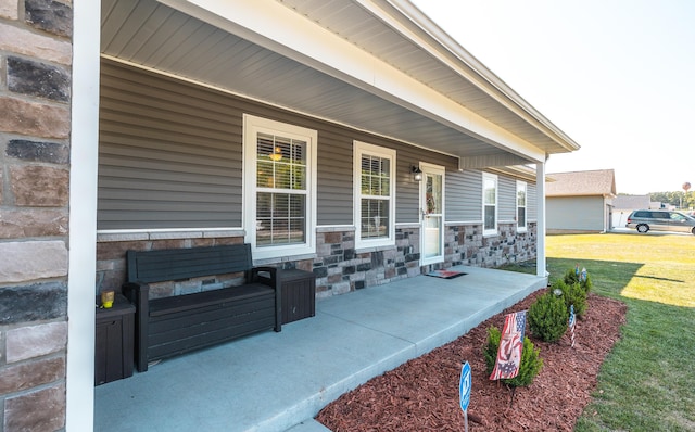 205 Seigenbein Rd, Saint Robert, MO 65584 - covered porch featuring a yard