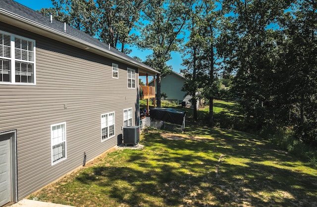 205 Seigenbein Rd, Saint Robert, MO 65584 - view of green lawn with central AC