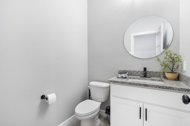 1816 N Bristol Ave, Springfield, MO 65802 - half bathroom with vanity, toilet, and baseboards