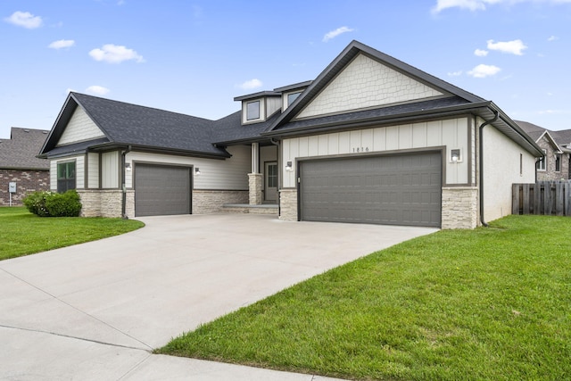 1816 N Bristol Ave, Springfield, MO 65802 - view of front of property with an attached garage, driveway, stone siding, board and batten siding, and roof with shingles