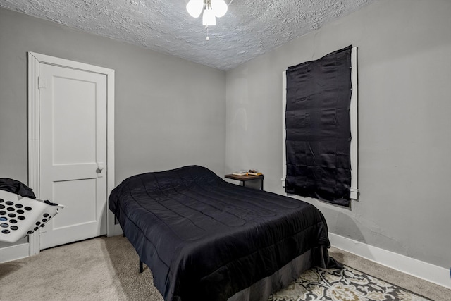 524 W Mckown St, Buffalo, MO 65622 - carpeted bedroom featuring baseboards and a textured ceiling