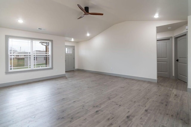 198 Michaels Dr, Hollister, MO 65672 - unfurnished living room featuring ceiling fan, lofted ceiling, baseboards, wood finished floors, and recessed lighting