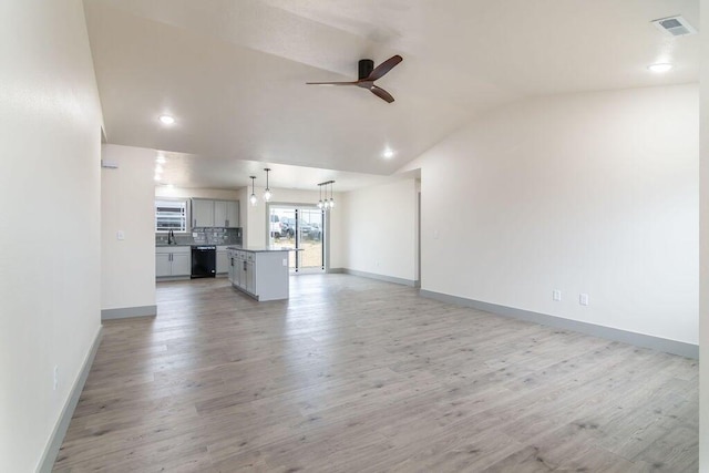 198 Michaels Dr, Hollister, MO 65672 - unfurnished living room with a ceiling fan, lofted ceiling, baseboards, light wood finished floors, and recessed lighting