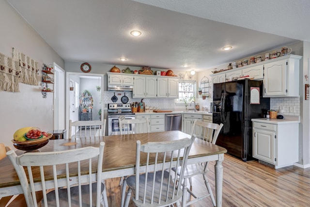 307 Azalea St, Duenweg, MO 64841 - dining room with light wood-style flooring and recessed lighting