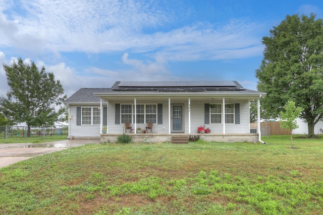 307 Azalea St, Duenweg, MO 64841 - view of front facade with covered porch and solar panels