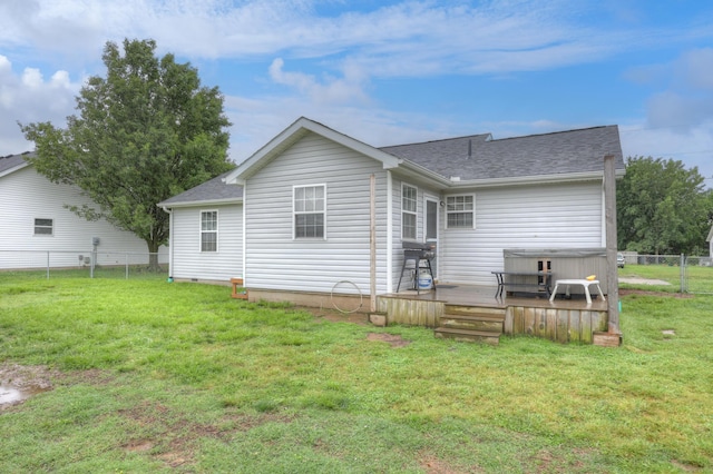 307 Azalea St, Duenweg, MO 64841 - back of property featuring a hot tub, a wooden deck, and a shingled roof