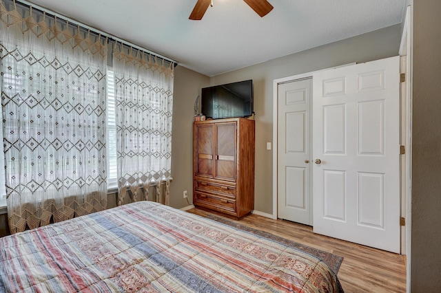307 Azalea St, Duenweg, MO 64841 - bedroom with wood finished floors, a ceiling fan, and baseboards