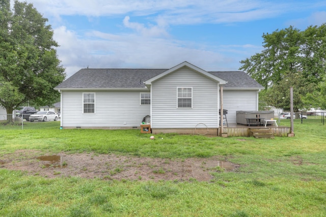 307 Azalea St, Duenweg, MO 64841 - back of property with a hot tub, a shingled roof, and a deck