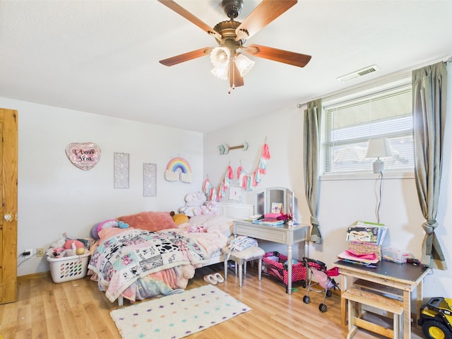 14164 Holmes Rd, Cabool, MO 65689 - bedroom with wood finished floors and a ceiling fan