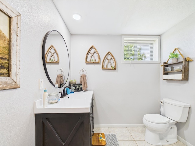 14164 Holmes Rd, Cabool, MO 65689 - bathroom featuring vanity, toilet, baseboards, and tile patterned flooring