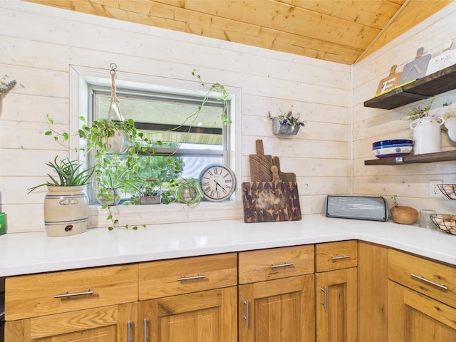 14164 Holmes Rd, Cabool, MO 65689 - kitchen with wooden walls, open shelves, wood ceiling, vaulted ceiling, and light countertops