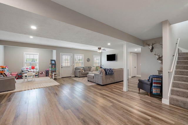 2025 Diego Ct, Bolivar, MO 65613 - living room featuring stairs, light wood finished floors, recessed lighting, a ceiling fan, and baseboards