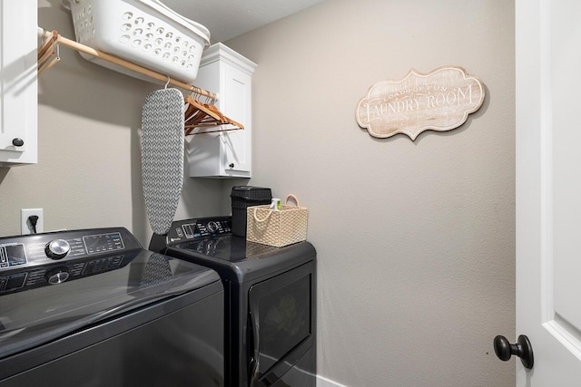 2025 Diego Ct, Bolivar, MO 65613 - laundry area with washing machine and dryer and cabinet space