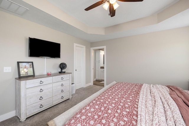 2025 Diego Ct, Bolivar, MO 65613 - bedroom with carpet flooring, baseboards, ceiling fan, and a raised ceiling