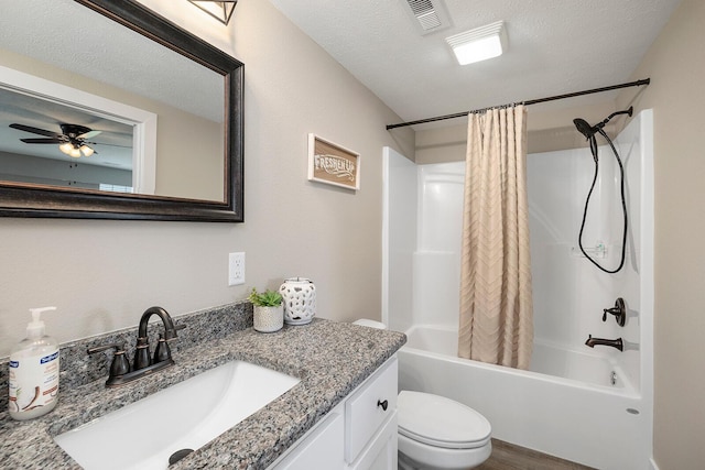 2025 Diego Ct, Bolivar, MO 65613 - full bath with toilet, vanity, shower / tub combo, a ceiling fan, and a textured ceiling