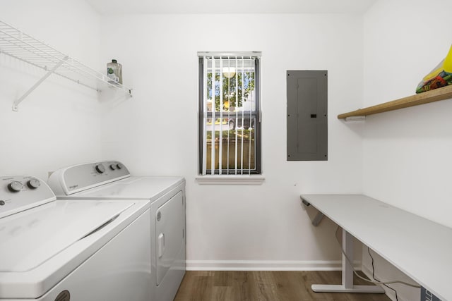 128 Bunker Ridge Rd Unit 2, Branson, MO 65616 - laundry area with electric panel, washing machine and clothes dryer, dark wood-style floors, and baseboards
