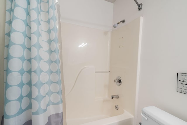 128 Bunker Ridge Rd Unit 2, Branson, MO 65616 - bathroom with shower / bath combo and toilet