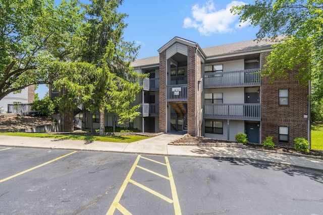 128 Bunker Ridge Rd Unit 2, Branson, MO 65616 - view of building exterior with uncovered parking