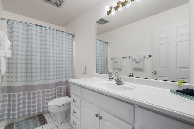 128 Bunker Ridge Rd Unit 2, Branson, MO 65616 - bathroom featuring vanity, toilet, tile patterned flooring, and a shower with curtain