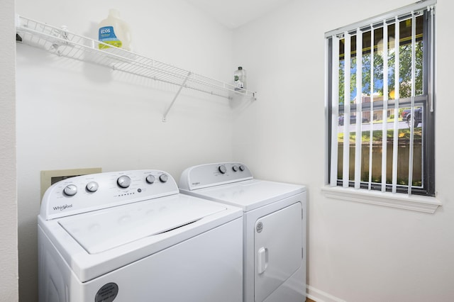 128 Bunker Ridge Rd Unit 2, Branson, MO 65616 - laundry room featuring washer and clothes dryer and baseboards
