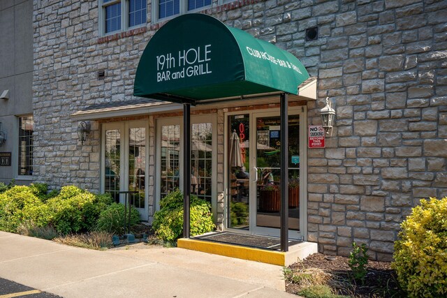 128 Bunker Ridge Rd Unit 2, Branson, MO 65616 - entrance to property featuring stone siding