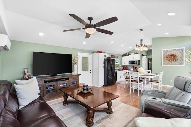 132 Nature Trail Ln, Noel, MO 64854 - living area with a ceiling fan, light wood finished floors, vaulted ceiling, a wall mounted AC, and recessed lighting