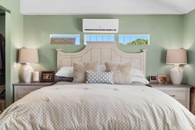 132 Nature Trail Ln, Noel, MO 64854 - bedroom featuring an AC wall unit and lofted ceiling