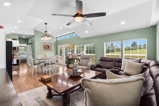 132 Nature Trail Ln, Noel, MO 64854 - living room featuring ceiling fan, light wood-type flooring, vaulted ceiling, recessed lighting, and a chandelier