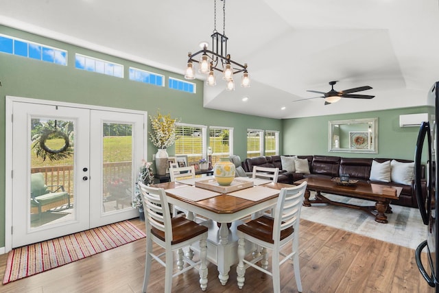 132 Nature Trail Ln, Noel, MO 64854 - dining room featuring a wall mounted AC, french doors, wood finished floors, healthy amount of natural light, and recessed lighting