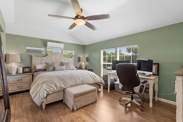 132 Nature Trail Ln, Noel, MO 64854 - bedroom with an AC wall unit, lofted ceiling, an office area, wood finished floors, and a ceiling fan