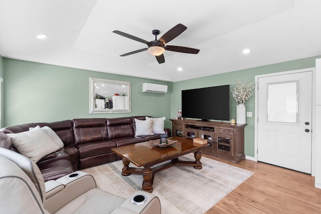 132 Nature Trail Ln, Noel, MO 64854 - living room with a wall mounted air conditioner, ceiling fan, light wood-type flooring, recessed lighting, and baseboards