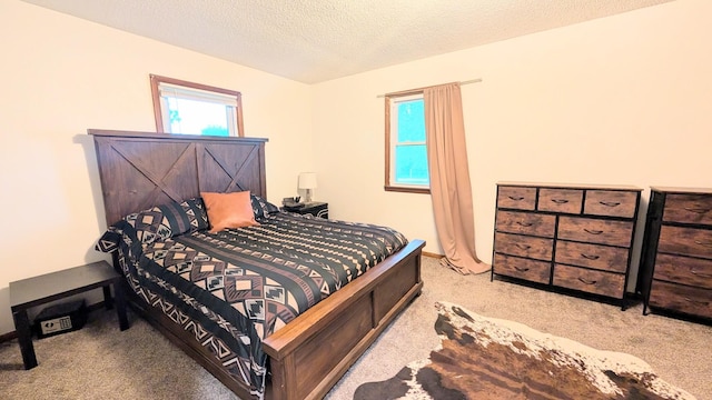 9550 S 325th Rd, El Dorado Springs, MO 64744 - carpeted bedroom with a textured ceiling