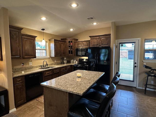 2818 E 16th St, Joplin, MO 64804 - kitchen featuring black appliances, a sink, dark brown cabinetry, recessed lighting, and lofted ceiling