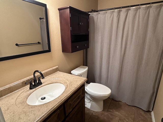 2818 E 16th St, Joplin, MO 64804 - full bathroom featuring toilet, vanity, tile patterned flooring, and a shower with shower curtain
