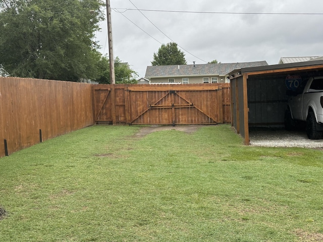 2818 E 16th St, Joplin, MO 64804 - view of yard featuring a gate and a carport