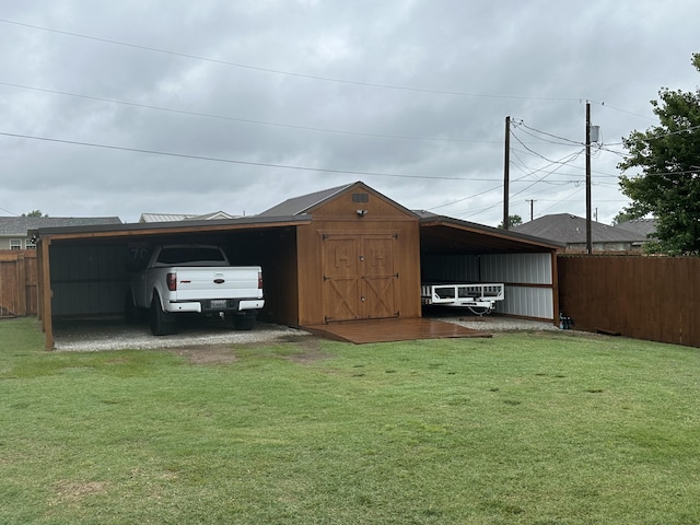 2818 E 16th St, Joplin, MO 64804 - view of shed with an attached carport