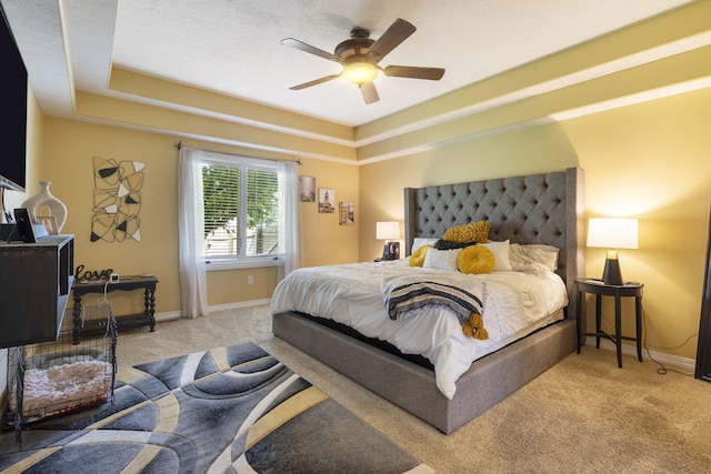 3909 W Eaglecrest St, Battlefield, MO 65619 - bedroom with carpet flooring, baseboards, ceiling fan, and a tray ceiling