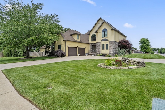 3909 W Eaglecrest St, Battlefield, MO 65619 - view of front of house with stone siding, concrete driveway, and stucco siding